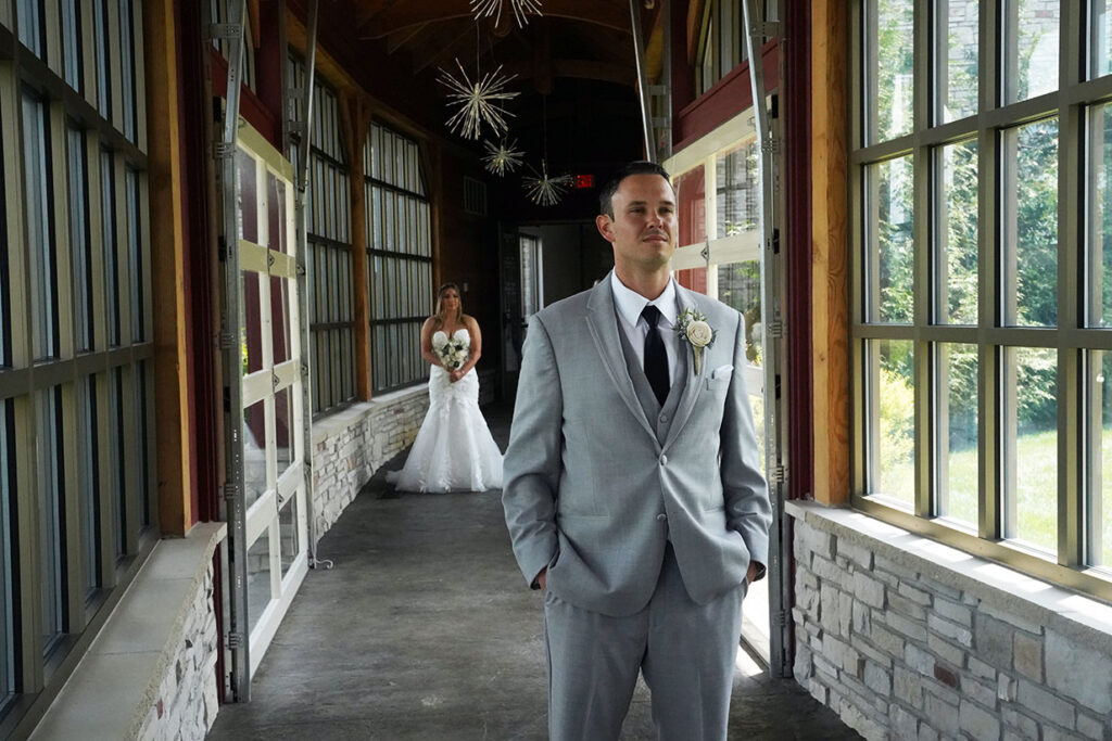 Bride and groom emotional first look moment at your wedding
